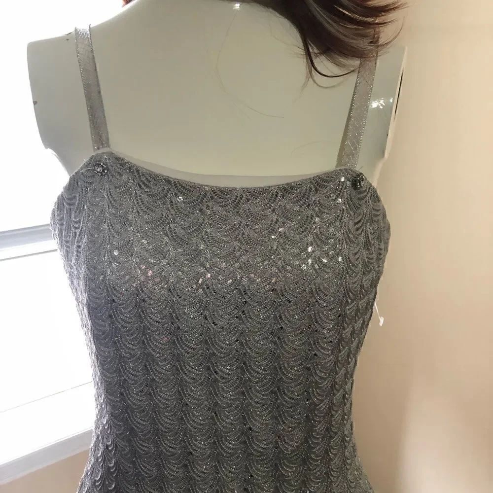 🔥Jessica McClintock one of a kind hand sewn silver body con gown. So pretty.